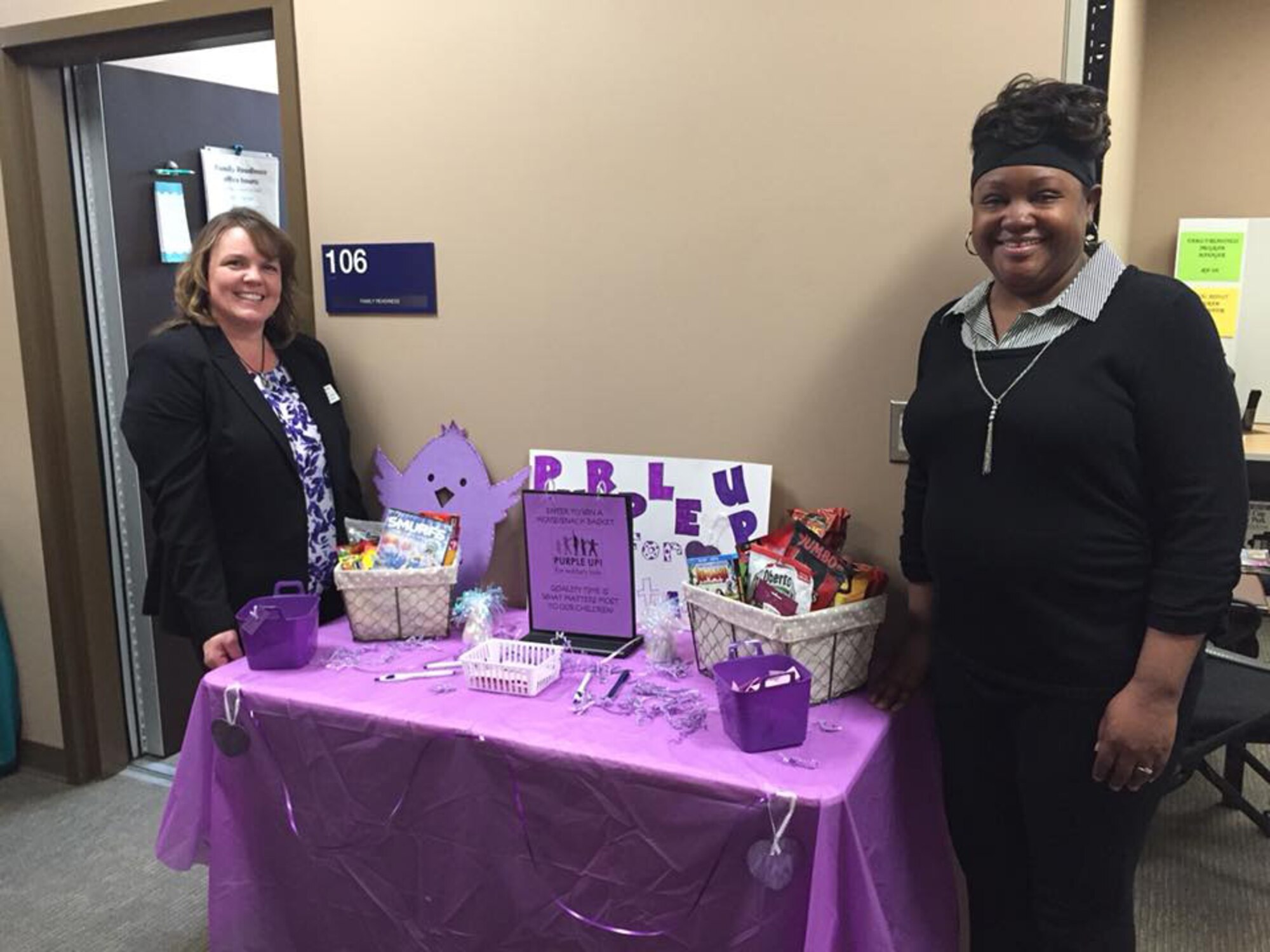 Rachel Hoak (left),193rd Special Operations Wing Airman and Family Readiness program manager, and Katrina Sylvain, 193rd SOW director of psychological health, hand out party favors at the grand opening of the 193rd SOW Resiliency Center April 7, 2018, in Middletown, Pennsylvania. The resiliency center is where Airmen and their families can go for access to a variety of resources associated with morale and readiness. (Photo courtesy of Rachel Hoak/Released)