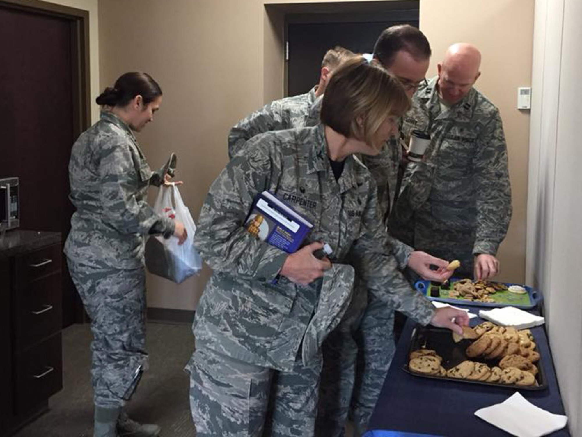 Airmen from the 193rd Special Operations Wing, Pennsylvania Air National Guard, participate in the grand opening of the new 193rd SOW Resiliency Center April 7, 2018 in Middletown, Pennsylvania. The grand opening included activities such as a family-fun night basket giveaway and a question-and-answer forum for Airmen to learn about the different resources available. (Photo courtesy of Rachel Hoak/Released)