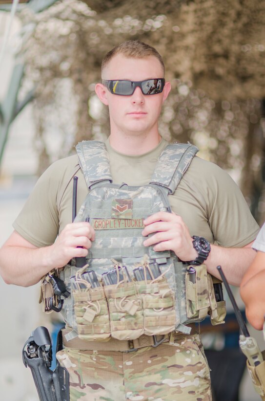 Senior Airman Gary-Alan Cropley-Tucker, 380th Security Forces, works a gate at Al Dhafra Air Base, United Arab Emirates on May 17, 2018. Air force security forces members are responsible for guarding launch facilities, and the security of installations and personnel. (U.S. Air National Guard photo by Staff Sgt. Ross Alexander Whitley)