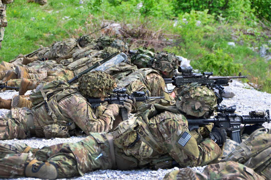 Soldiers engage targets during a live-fire exercise.