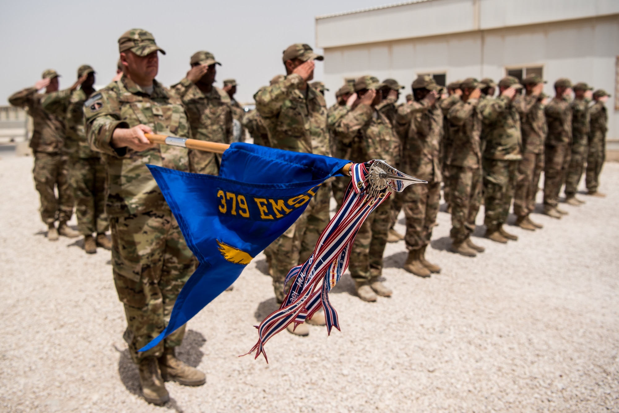 Airmen from the 379th Expeditionary Security Forces Squadron take time to remember the sacrifices of fallen security forces members during a fallen defender memorial ceremony at Al Udeid Air Base, Qatar, May 18, 2018. The ceremony, taking place during National Police Week 2018, was one of the week’s many events in addition to a 24-hour remembrance walk, a law enforcement tactics demonstration, a military working dog competition and a 5K ruck. (U.S. Air Force Photo by Staff Sgt. Joshua Horton)