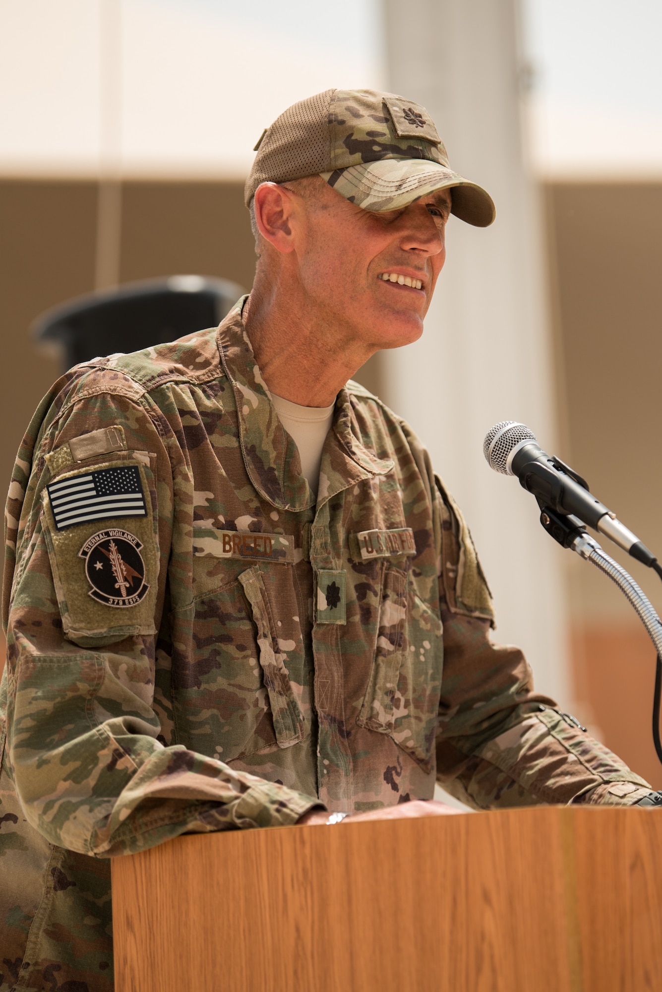 Lt. Col. Mark W. Breed, commander of the 379th Expeditionary Security Forces Squadron, addresses the crowd during a fallen defender memorial ceremony at Al Udeid Air Base, Qatar, May 18, 2018. The ceremony, taking place during National Police Week 2018, was one of the week’s many events in addition to a 24-hour remembrance walk, a law enforcement tactics demonstration, a military working dog competition and a 5K ruck. (U.S. Air Force Photo by Staff Sgt. Joshua Horton)