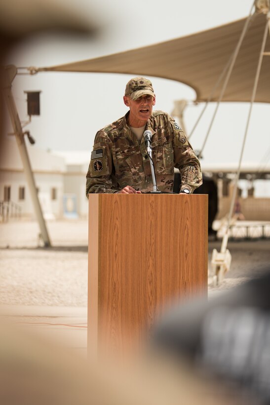 Lt. Col. Mark W. Breed, commander of the 379th Expeditionary Security Forces Squadron, addresses the crowd during a fallen defender memorial ceremony at Al Udeid Air Base, Qatar, May 18, 2018. The ceremony, taking place during National Police Week 2018, was one of the week’s many events in addition to a 24-hour remembrance walk, a law enforcement tactics demonstration, a military working dog competition and a 5K ruck. (U.S. Air Force Photo by Staff Sgt. Joshua Horton)