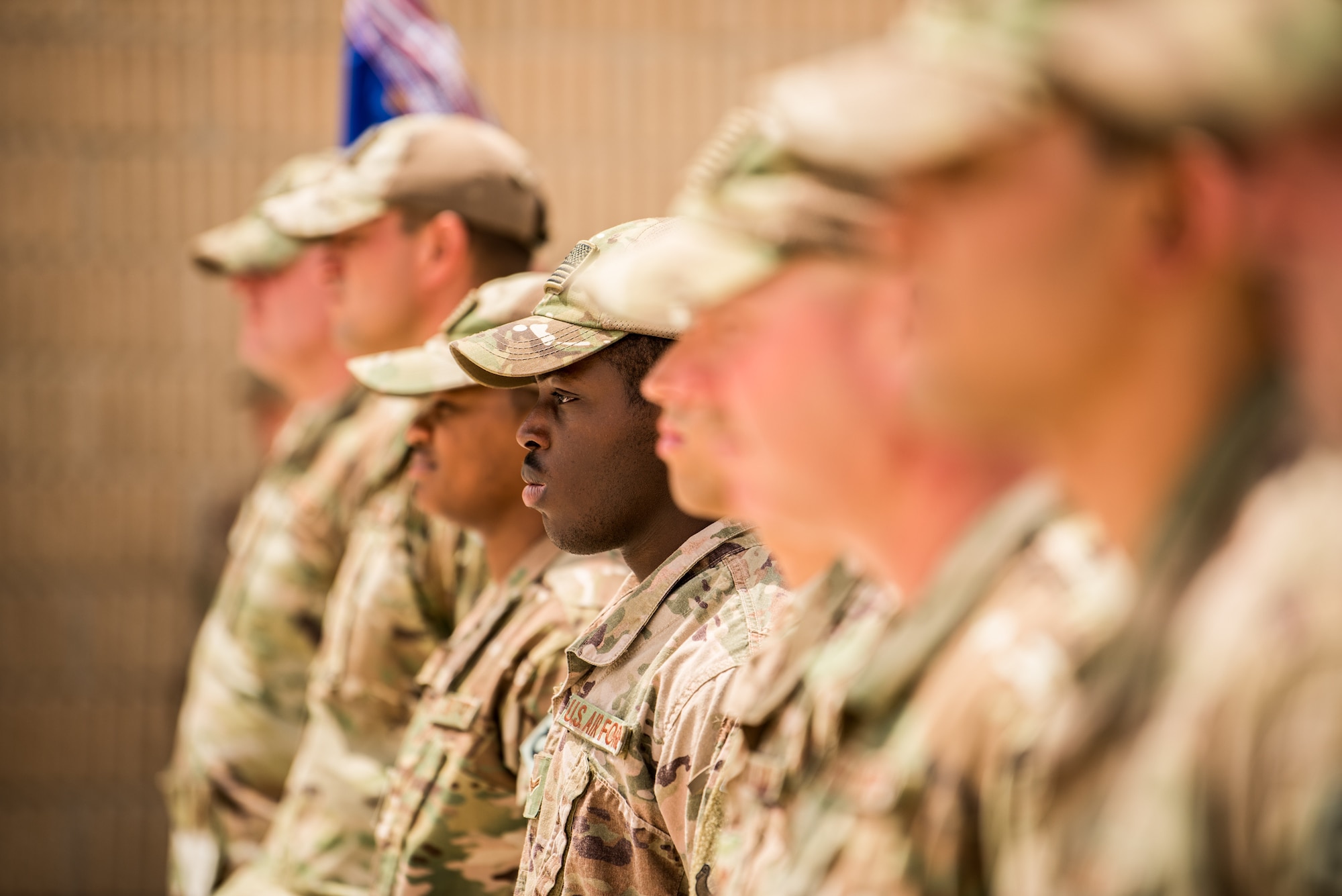 Airmen from the 379th Expeditionary Security Forces Squadron take time to remember the sacrifices of fallen security forces members during a fallen defender memorial ceremony at Al Udeid Air Base, Qatar, May 18, 2018. The ceremony, taking place during National Police Week 2018, was one of the week’s many events in addition to a 24-hour remembrance walk, a law enforcement tactics demonstration, a military working dog competition and a 5K ruck. (U.S. Air Force Photo by Staff Sgt. Joshua Horton)