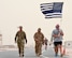 Members of the 379th Expeditionary Security Forces Squadron participate in a 24-hour remembrance walk during National Police Week at Al Udeid Air Base, Qatar, May 13, 2018. Throughout the week, security forces members held numerous events in honor of defenders who died in the line of duty. (U.S. Air Force photo by Staff Sgt. Enjoli Saunders)