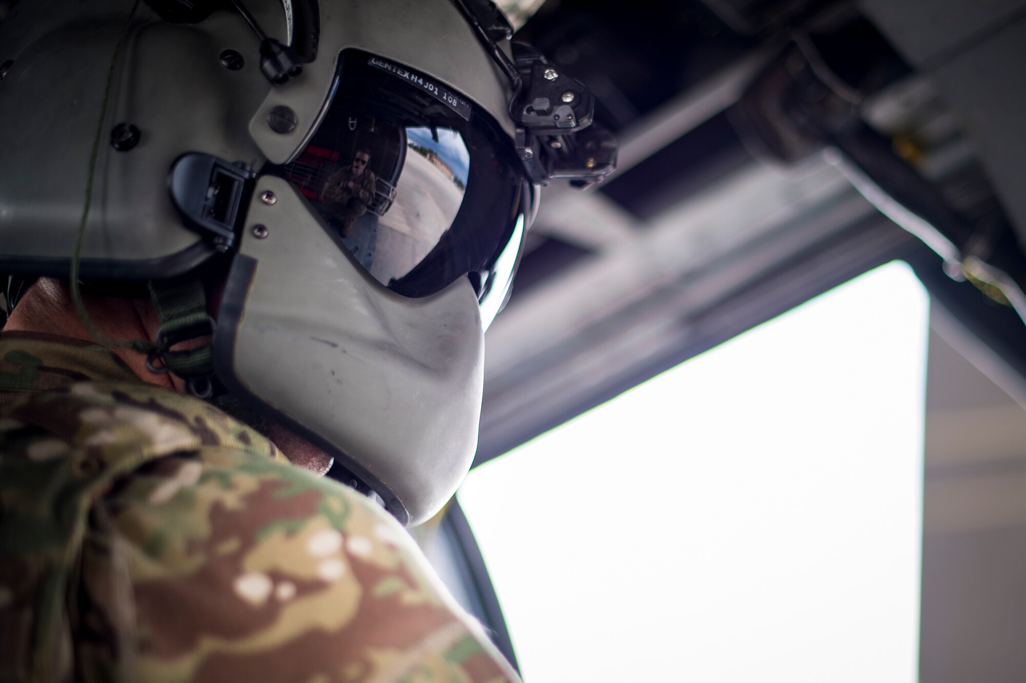 A special missions aviator from the 41st Rescue Squadron performs a systems check prior to flying in an HH-60G Pave Hawk, May 17, 2018, at Moody Air Force Base, Ga. Airmen conduct routine training missions in the airspace surrounding Moody to remain current on their tactics and procedures. While helping pilots remain proficient, training also gives crew chiefs and maintainers the opportunity to remain proficient at launching and maintaining the aircraft. (U.S. Air Force photo by Senior Airman Janiqua P. Robinson)
