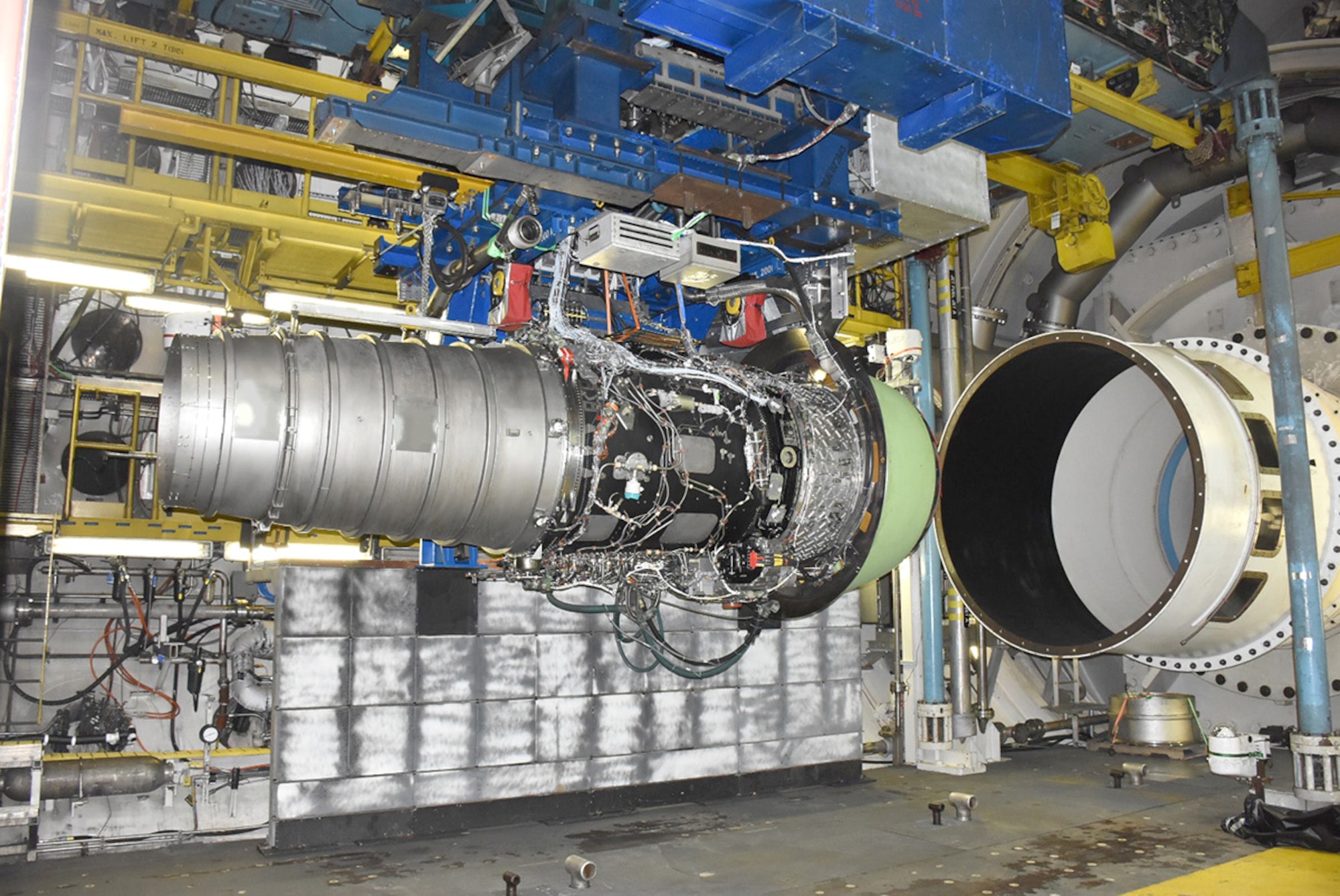 The Rolls-Royce engine is set up here in free-jet mode inside the AEDC C-2 test cell at Arnold Air Force Base. Transonic speeds with large volumetric flow rates were recently achieved during free-jet testing of this high-bypass engine, setting a record for free-jet mode engine testing. (U.S. Air Force photo)