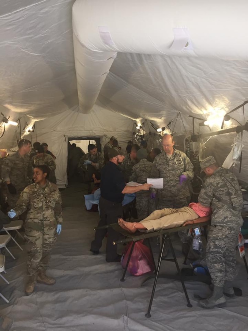 Members of Task Force Medical, one of four task forces attached to the Defense Chemical, Biological, Radiological and Nuclear Response Force (DCRF), conduct medical drills during Vibrant Response 2018 (VR18). Vr18 is an annual exercise that tests Joint Task Force-Civil Support’s and the DCRF’s ability to respond to a catastrophic event. (Official DoD photo by Army Capt. Elizabeth Boggs/released)