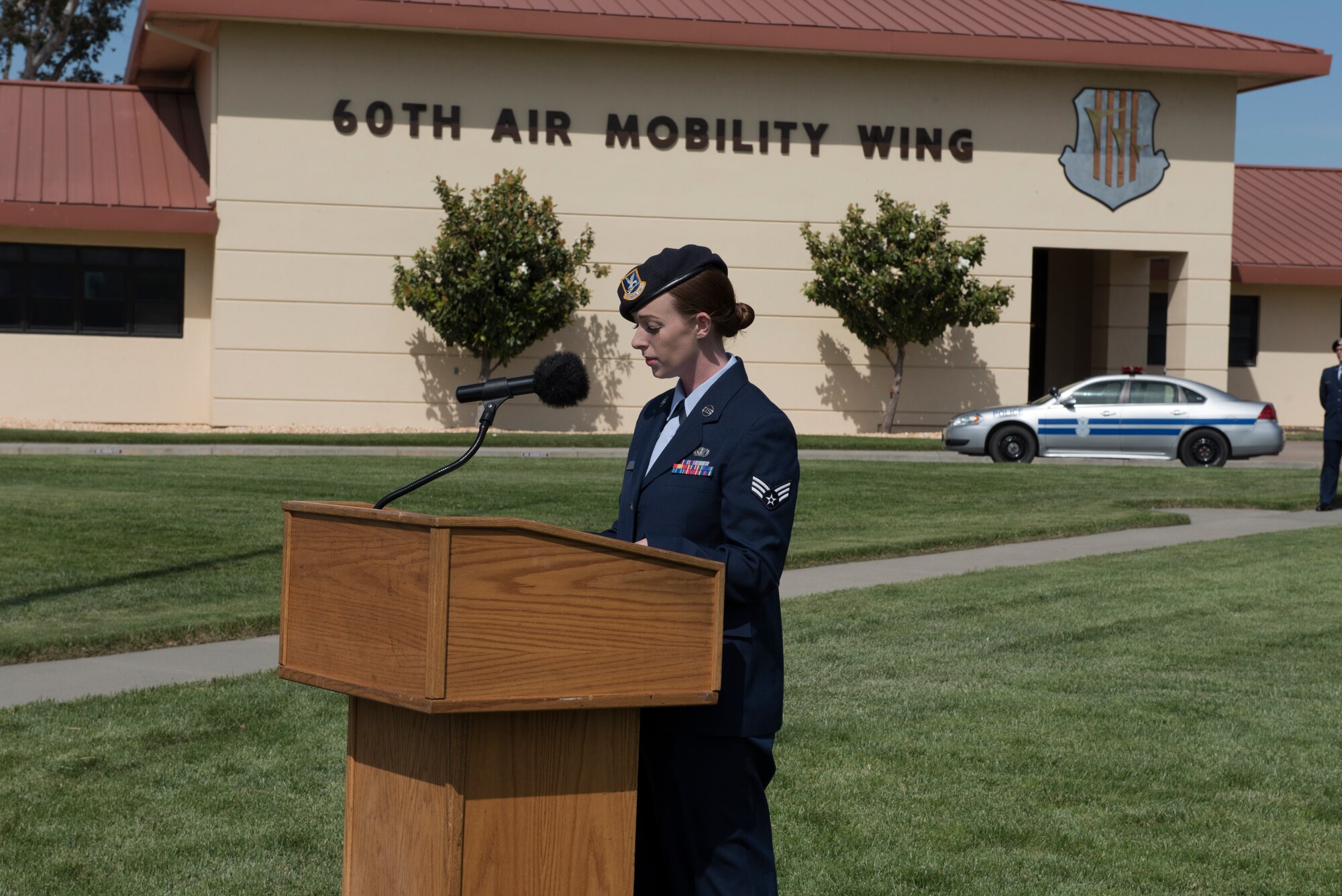 Staff Sgt. Elisabeth Shafer, 60th Security Forces Squadron installation patrolman, serves as the emcee for the Police Week Retreat Ceremony May 18, 2018 at Travis Air Force Base, Calif. The ceremony closed out Police Week observances for Travis and featured a roll call for 27 fallen Airmen, the playing of Taps and the ceremonious folding of the American flag. (U.S. Air Force photo by Tech. Sgt. James Hodgman)
