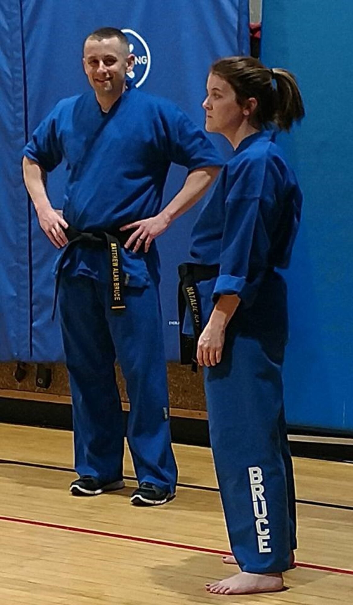 Matthew and Natalie Bruce take a break during a martial arts session at the Youth Center gym. (Courtesy photo)