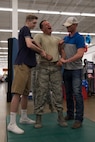 Senior Airman Andrzej Jeglinski, member of the 902nd Security Forces Squadron, takes part in a Taser demo May 17, 2018, inside the Main Base Exchange on Joint Base San Antonio-Randolph, Texas to demonstrate the effect a Taser has on the human body. After Security Forces tech school, it is a requirement for each Airman to get Tased so they know what exactly is happening when they utilize this weapons on others.