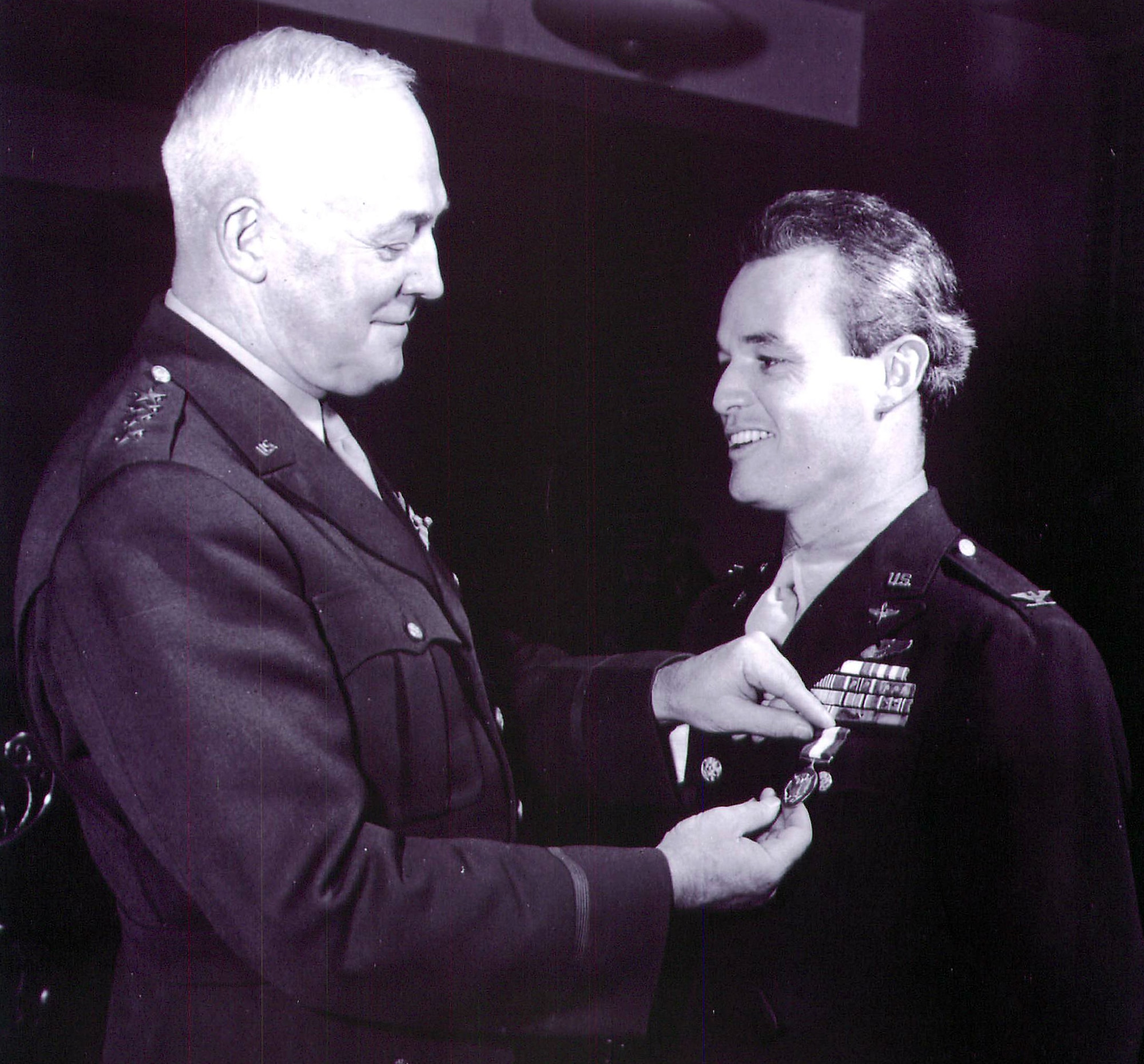 Col Philip Cochran is decorated by Gen. Henry 'Hap' Arnold, Air Force chief of staff.