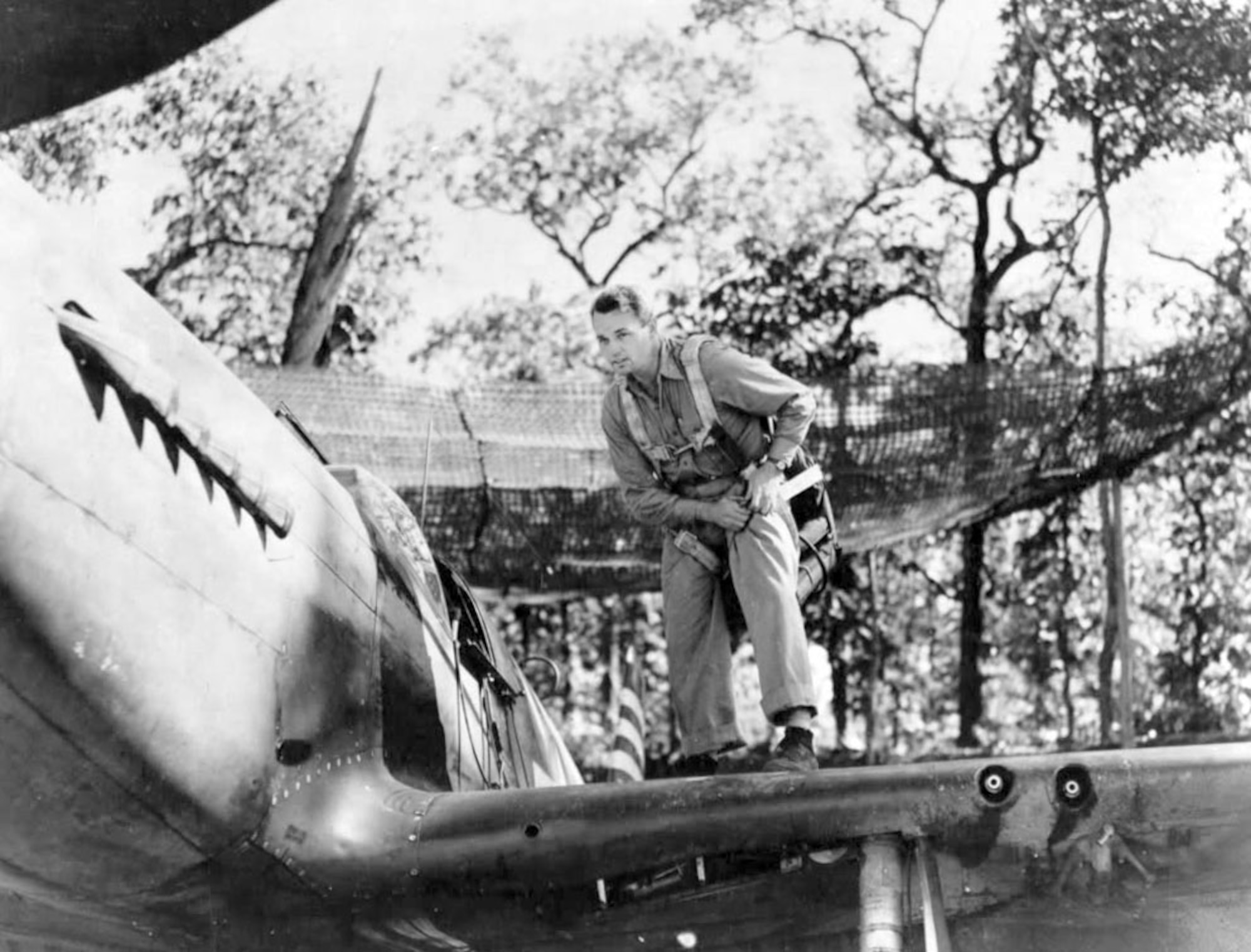 Col Phil Cochran prepares for a mission in a P-51.