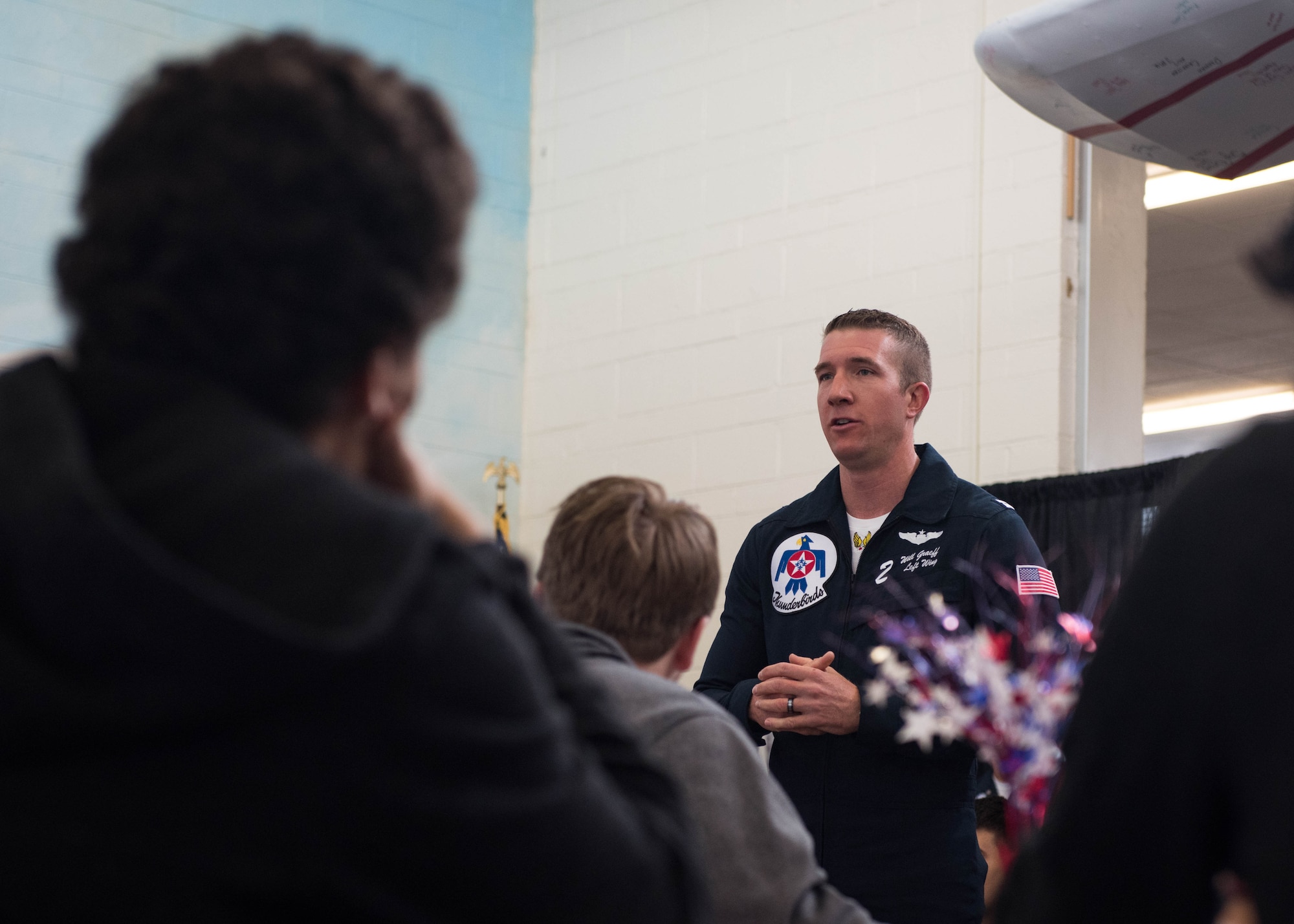 U.S. Air Force Capt. Will Graeff, Thunderbirds number 2 jet pilot, speaks with students of Denbigh High School during career week at Newport News, Virginia, May 18, 2018.