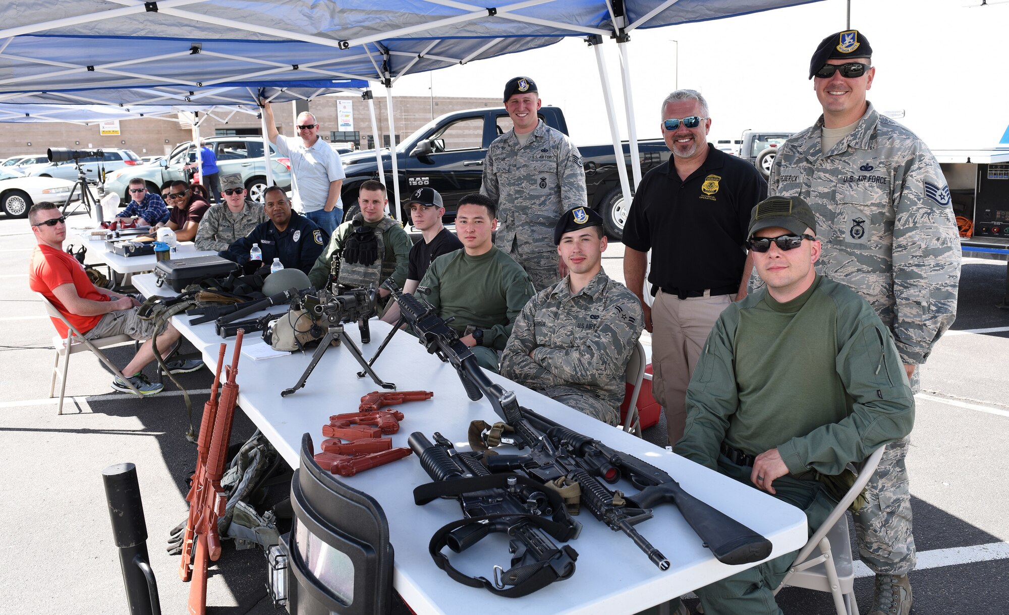 Members of Team Buckley gather for a group photo during a Police Week demonstration at Buckley Air Force Base, Colorado, May 17, 2018.