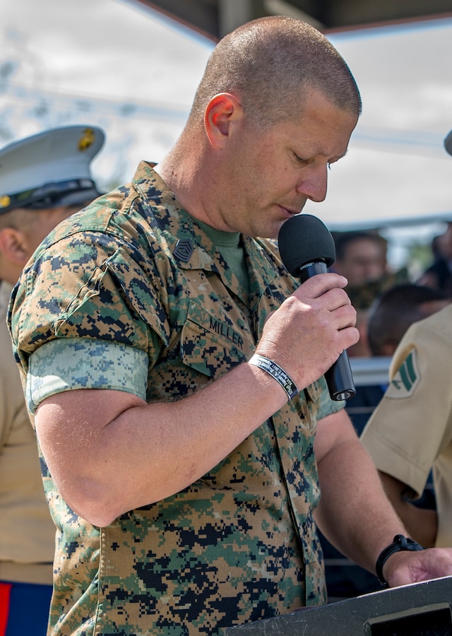 1st Sgt. John Miller, the Headquarters Company, I Marine Expeditionary Force Support Battalion, company first sergeant, narrates the I MEF sergeant major relief and appointment ceremony on Camp Pendleton, Calif., May 18, 2018. Sgt. Maj. James Porterfield replaced Sgt. Maj. Bradley Kasal as I MEF sergeant major. Kasal has served as I MEF sergeant major since 2015 and is retiring from the Marine Corps after 34 years of service. (U.S. Marine Corps photo by Lance Cpl. Clare Mcintire)