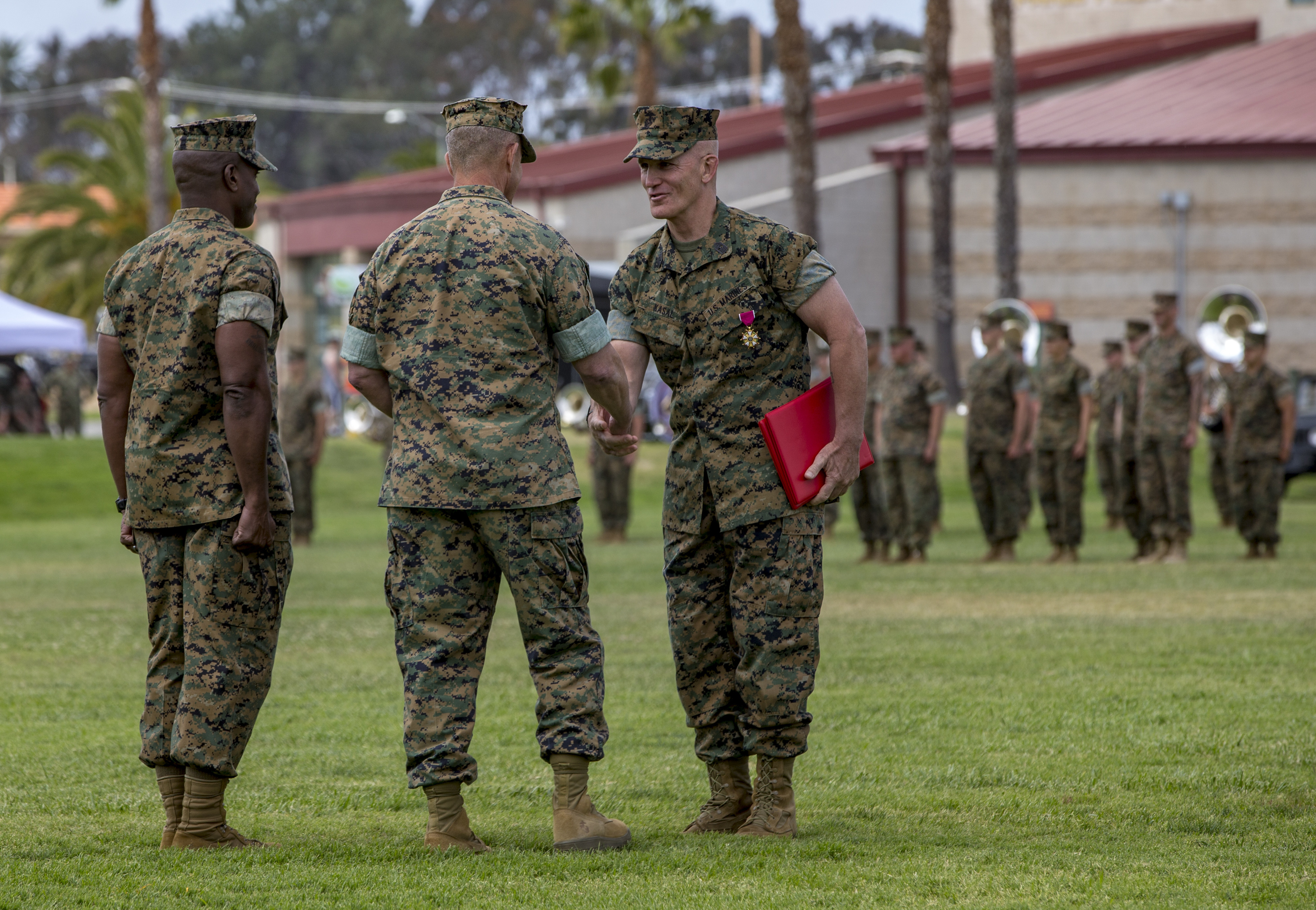 Sgt. Maj. Kasal passes on the sword of office > I Marine Expeditionary ...