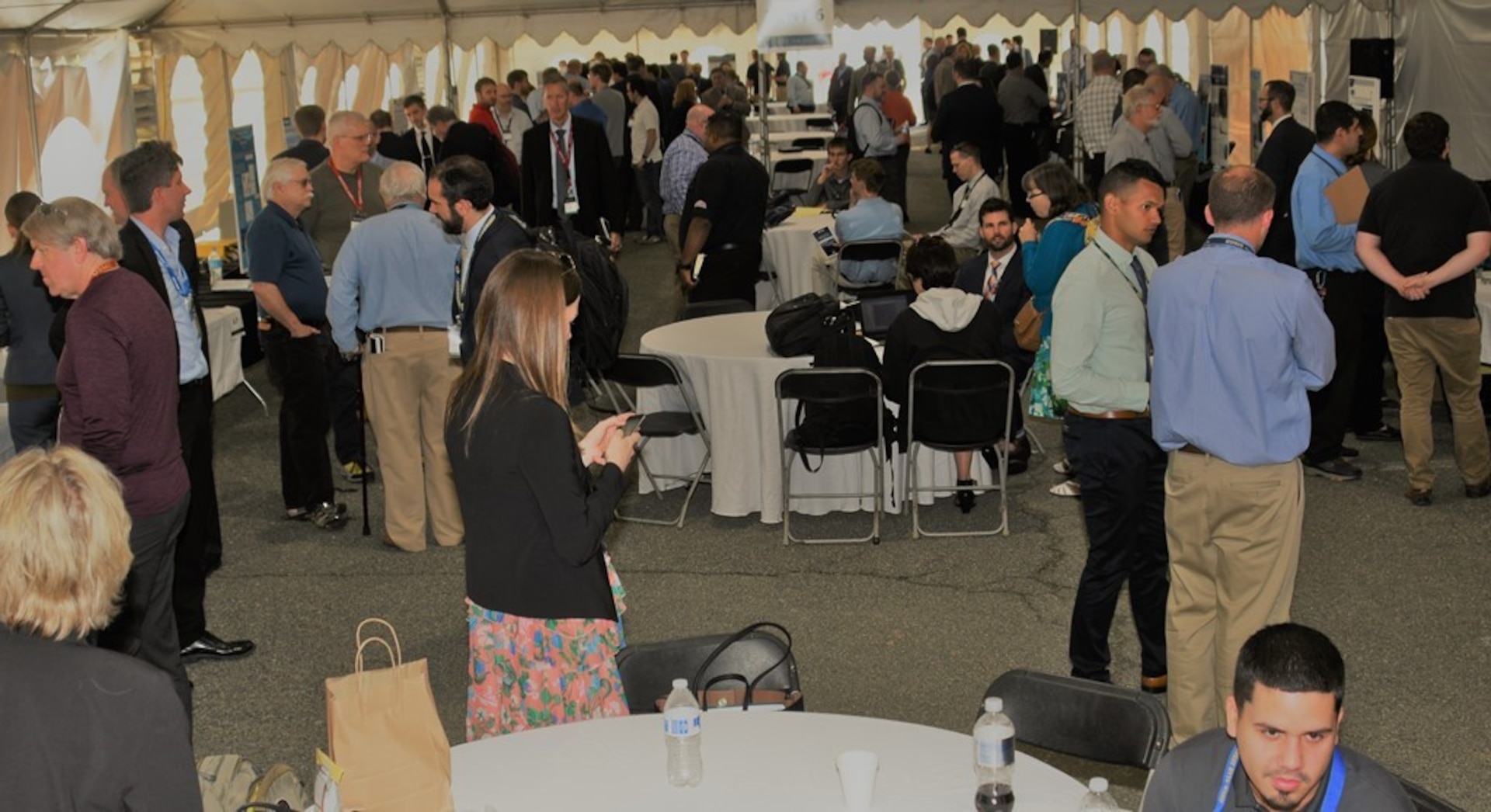 IMAGE: DAHLGREN, Va. (May 2, 2018) - Naval Research and Development Establishment (NR&DE) scientists and engineers present more than 150 technological projects at the two-day 2018 Naval Innovative Science and Engineering (NISE) Technical Exchange Meeting held at Naval Surface Warfare Center Dahlgren Division. The audience - a who's who in Department of Defense technical leaders, scientists and engineers - arrived at the Deputy Assistant Secretary of Defense for Research, Development, Test and Evaluation sponsored event to see and learn about the NISE projects and their alignment to naval systems and naval needs. (U.S. Navy photo/Released)