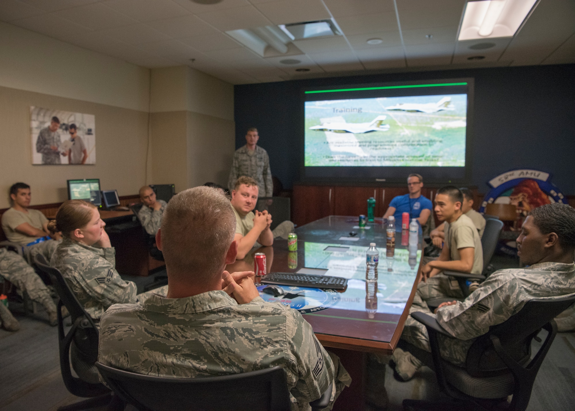 U.S. Air Force Staff Sgt. Corey Hedman, 33rd Fighter Wing Aircraft Maintenance Squardron avionics specialist, leads a small group discussion May 18, 2018, at Eglin Air Force Base, Fla. In addition to the large Operational Safety Review forum, Airmen gathered in small groups to provide personal input on identifying risks and taking action to prevent mishaps. (U.S. Air Force photo by Airman 1st Class Emily Smallwood)