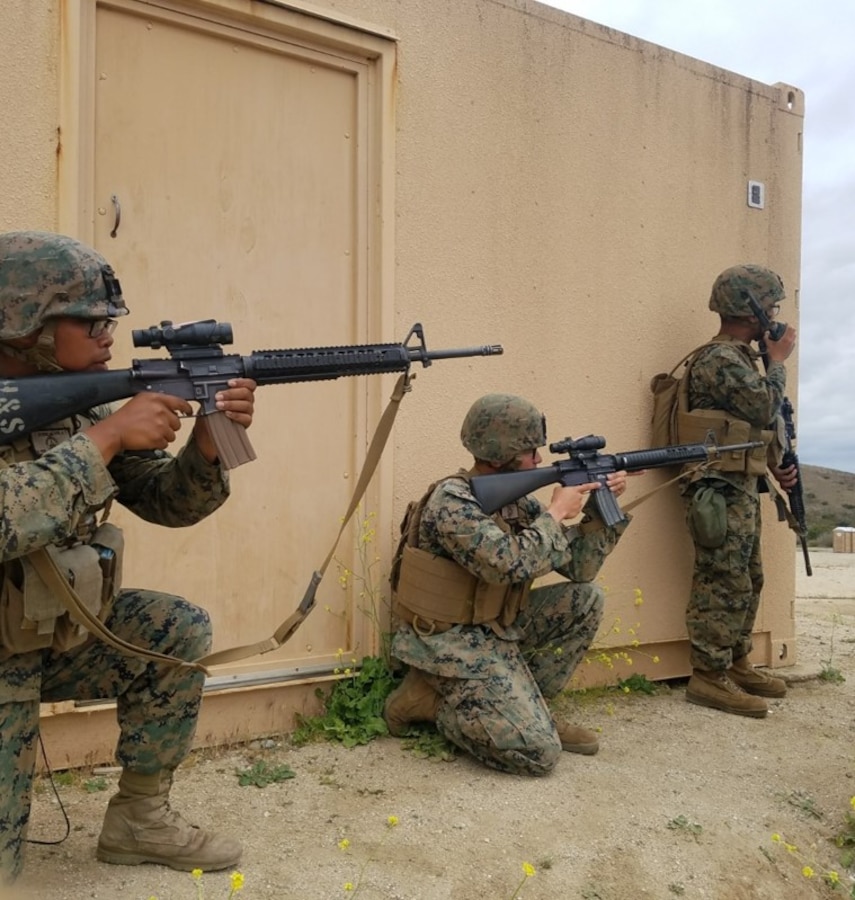 Marines of Transmissions Platoon, Company A on a security patrol outside of their antenna hill compound.