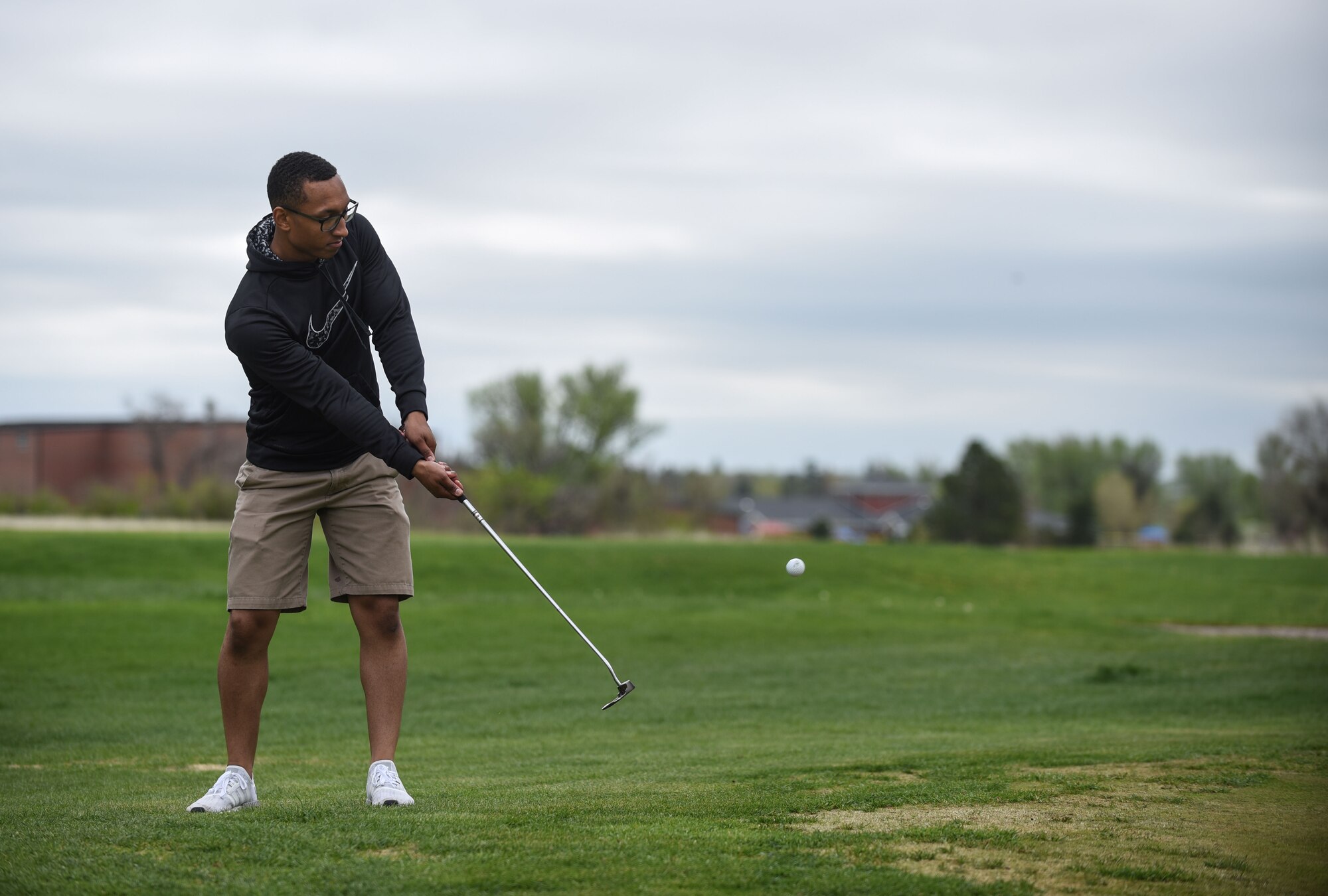 Senior Airman Samuel Ward, 90th Security Support Squadron unmanned aerial system pilot, putts during the Police Week Security Force golf tournament, May 18, 2018, on F.E. Warren Air Force Base, Wyo. Teams came out for a relaxed round of golf to end Police Week with a good time. In 1962, President John F. Kennedy signed a proclamation which designated May 15 as Peace Officers Memorial Day and the week in which that date falls as Police Week. People all across the United States participate in various events which honor those who have paid the ultimate sacrifice. (U.S. Air Force photo by Airman 1st Class Braydon Williams)