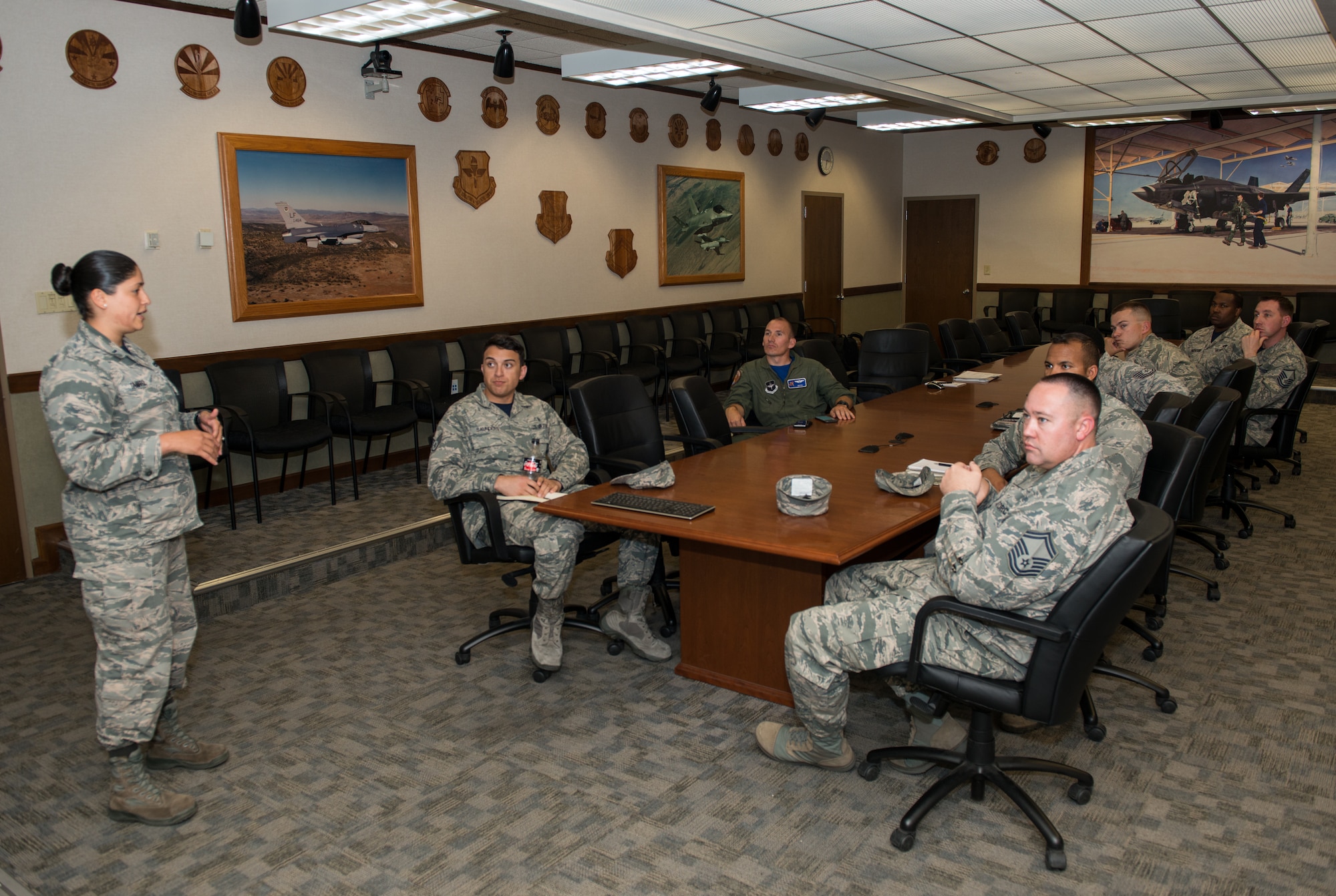 First Lt. Mariana Tamariz, 56th Fighter Wing executive officer, conducts a briefing during the Bold Operational Leadership Team class at Luke Air Force Base, Ariz., May 18, 2018. Through the BOLT Initiative, Tamariz provides valuable tools for Airmen to improve their professional growth and development at the 56th FW. (U.S. Air Force photo by Airman 1st Class Alexander Cook)
