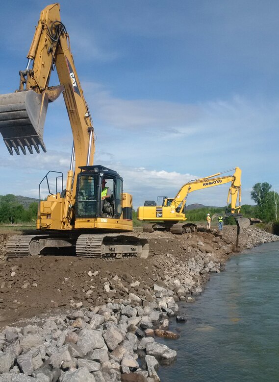 The Corps awarded the emergency repair contract May 18 to help Jefferson County emergency managers and Flood Control District #1 stabilize an eroded area of the Heise-Roberts Levee System on the Snake River near Lorenzo, Idaho. As of Monday morning (May 21), contractors have repaired more than two-thirds of the 300-feet-long by 15-feet-wide section of levee that was eroded away by seasonal high flows in the Snake River. In some locations the levee has been eroded more than 20 feet in height from the top of the levee -- about 8 feet of the levee is visible above the water’s surface. If not repaired, the erosion poses a threat to the structural integrity of the levee and about 65 homes located within the leveed area.