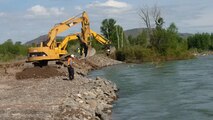 The Corps awarded the emergency repair contract May 18 to help Jefferson County emergency managers and Flood Control District #1 stabilize an eroded area of the Heise-Roberts Levee System on the Snake River near Lorenzo, Idaho. As of Monday morning (May 21), contractors have repaired more than two-thirds of the 300-feet-long by 15-feet-wide section of levee that was eroded away by seasonal high flows in the Snake River. In some locations the levee has been eroded more than 20 feet in height from the top of the levee -- about 8 feet of the levee is visible above the water’s surface. If not repaired, the erosion poses a threat to the structural integrity of the levee and about 65 homes located within the leveed area.