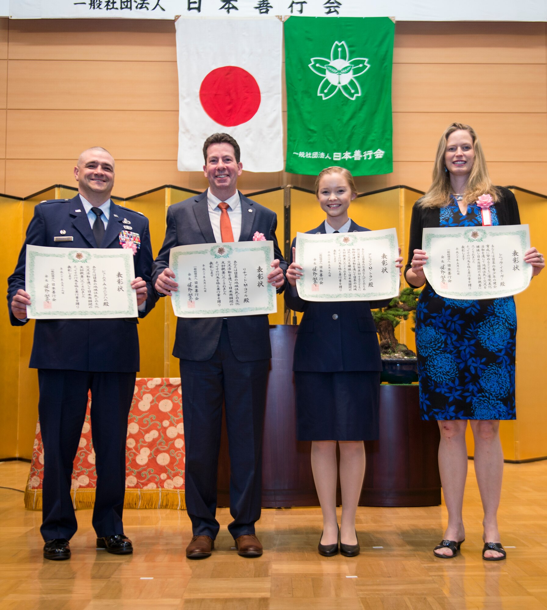 Good Deed Award winners pose with their certificates