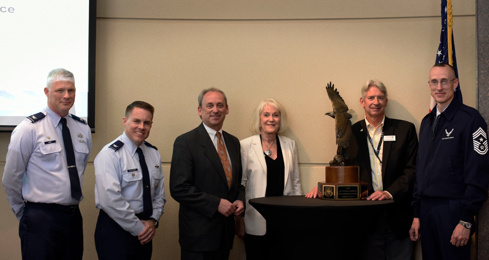 Fairchild Air Force Base leadership pose with members of Greater Spokane Incorporation May 21, 2018. Yvonne Batts presented the Air Mobility Command Abilene Trophy to the Greater Spokane community at GSI. Spokane competed with other AMC communities for best community support to their corresponding AMC bases. This is the fourth time Spokane has won the trophy. 

(From left to right) Col. Alan Hart, 92nd Maintenance Group commander, Col. Scot Heathman, 92nd Air Refueling Wing vice commander, Todd Mielke, GSI chief executive officer, Yvonne Batts, Abilene Trophy committee member, Kevin Twohig, Spokane facilities district, Chief Master Sgt. Lee Mills, 92nd ARW command chief.