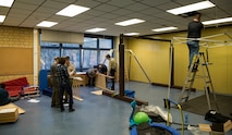 Louis Roscoe, a Boy Scouts of America Life Scout (second highest rank in BSA) and student at Kaiserslautern High School, works with friends and family to construct the sensory room at Vogelweh Elementary School on Vogelweh Military Complex, Germany, May 15, 2018. A sensory room combines a range of stimuli to help individuals develop and engage their senses, and assist children with learning disabilities with processing sensory information.