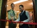 Louis Roscoe, a Boy Scouts of America Life Scout (second highest rank in BSA) and student at Kaiserslautern High School, and David Lee, Vogelweh Elementary School principal, cut the red-ribbon for the sensory room at Vogelweh Elementary School on Vogelweh Military Complex, Germany, May 15, 2018. With the help of friends and family, Roscoe was able to raise over $13,000 for the sensory room.