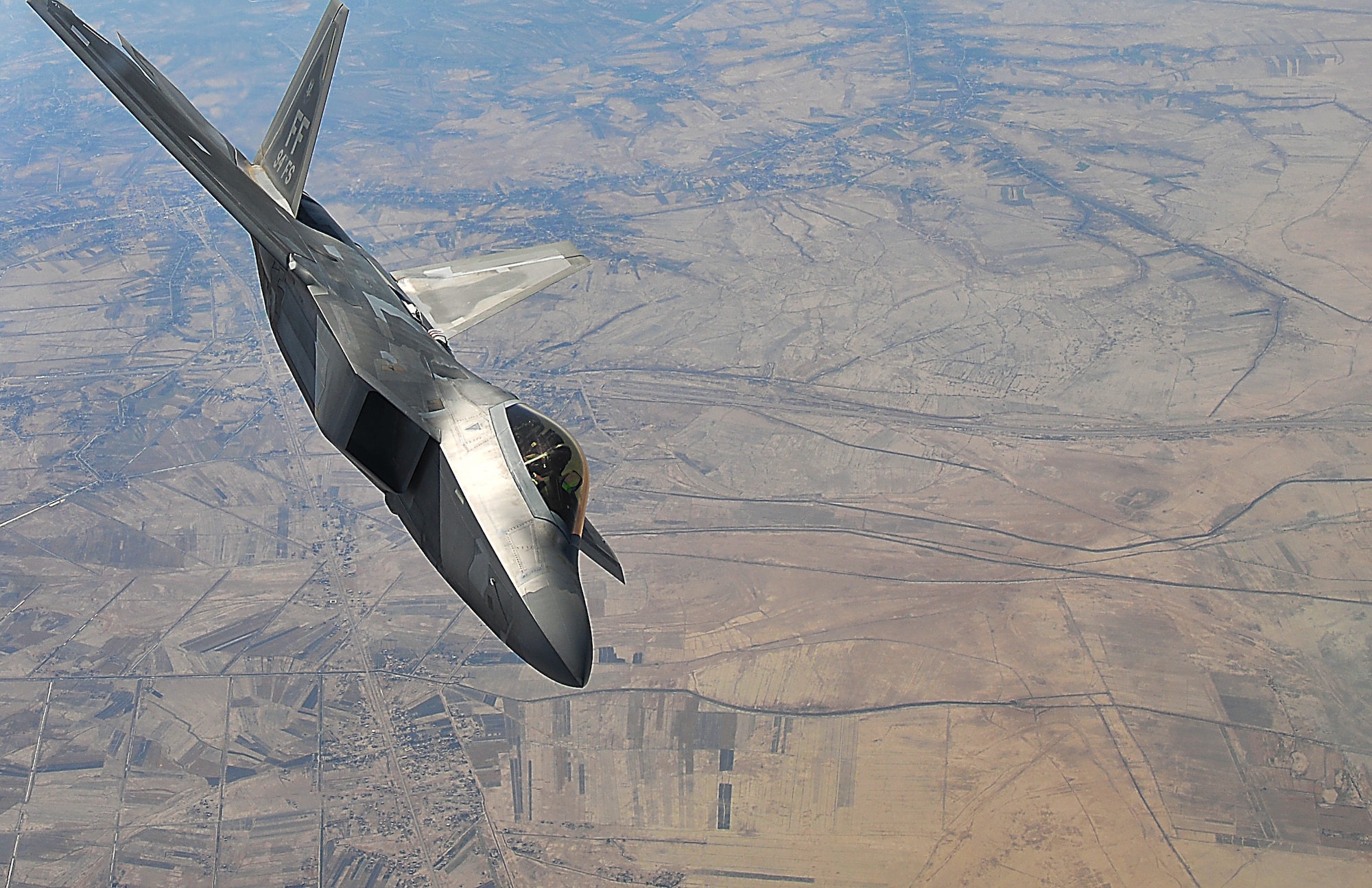 A F-22 Raptor assigned to the 94th Fighter Squadron at the 380th Air Expeditionary Wing, Al Dhafra Air Base, supports Operation Inherent Resolve over the skies of Southwest Asia.