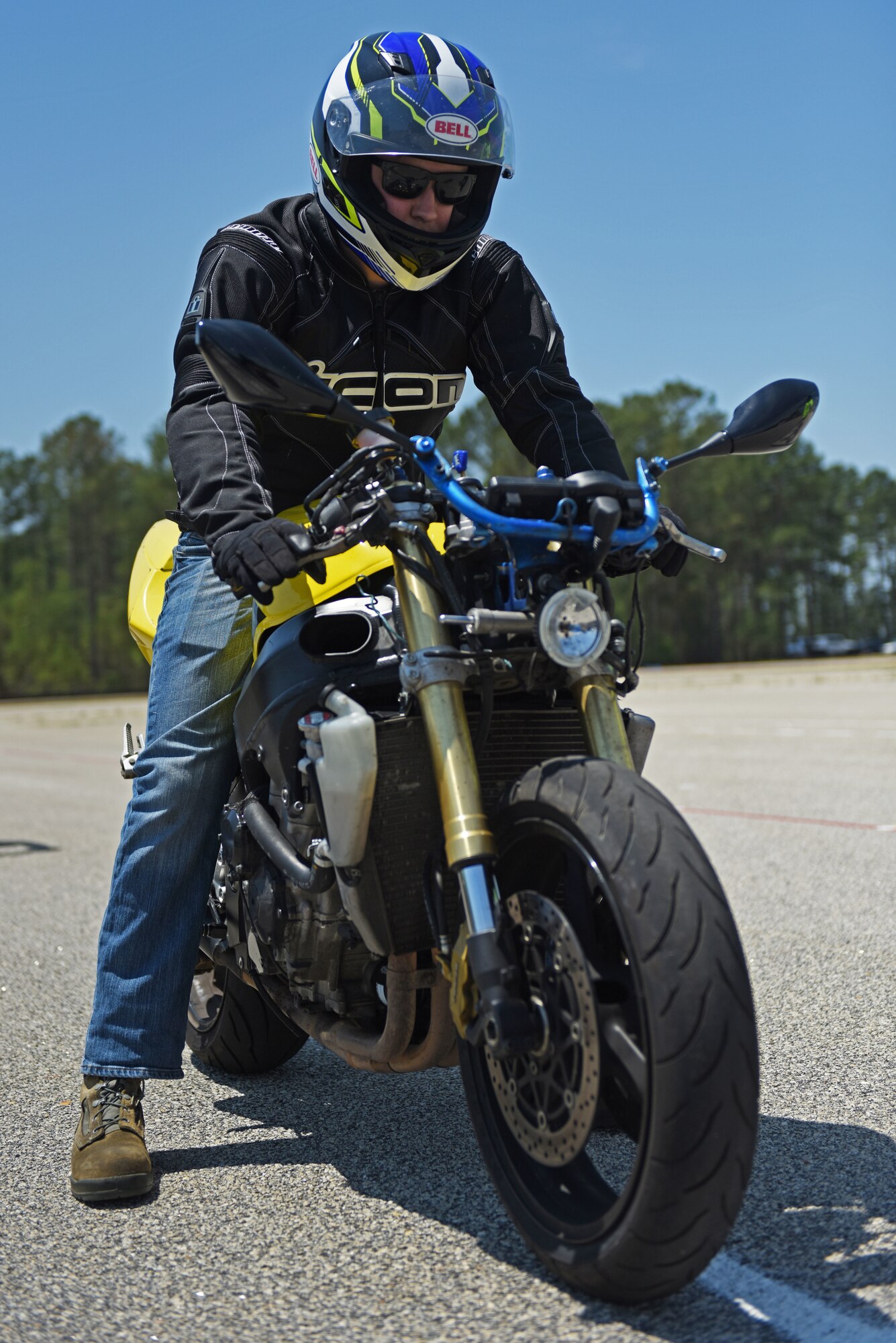 A Team Shaw Airman looks over his motorcycle during a Basic Riders Course (BRC) at Shaw Air Force Base, S.C., May 10, 2018.