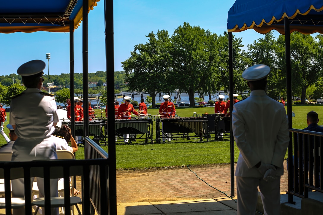 Marines with “The Commandant’s Own” U.S. Marine Drum & Bugle Corps perform musical ballads during a Battle Color Ceremony as a part of the U.S. Naval Academy Commissioning Week at the USNA, Annapolis, MD, May 21, 2018. Parents, family members and guests of the First Class Midshipmen were invited to attend a series of events, including the BCD, in honor of the graduates. (Official Marine Corps photo by Cpl. Damon Mclean/Released)