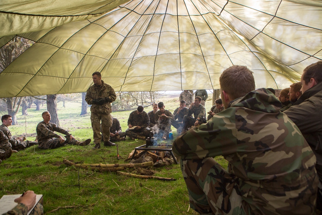 British Army Staff Sgt. Steven Kelly, survival instructor with 29th Commando Regiment, Artillery Battery, teaches Marines with 4th Air Naval Gunfire Liaison Company, Force Headquarters Group, necessary survival procedures should they be stuck in the wilderness for an extended time, in Durness, Scotland, April 26, 2018.