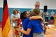 Kaiserslautern Military Community Summer Special Olympians embrace each other after receiving their medals on Ramstein Air Base, Germany, May 18, 2018. Members of the KMC worked together to help students with special needs build confidence and discover their physical potential. (U.S. Air Force photo by Senior Airman Joshua Magbanua)