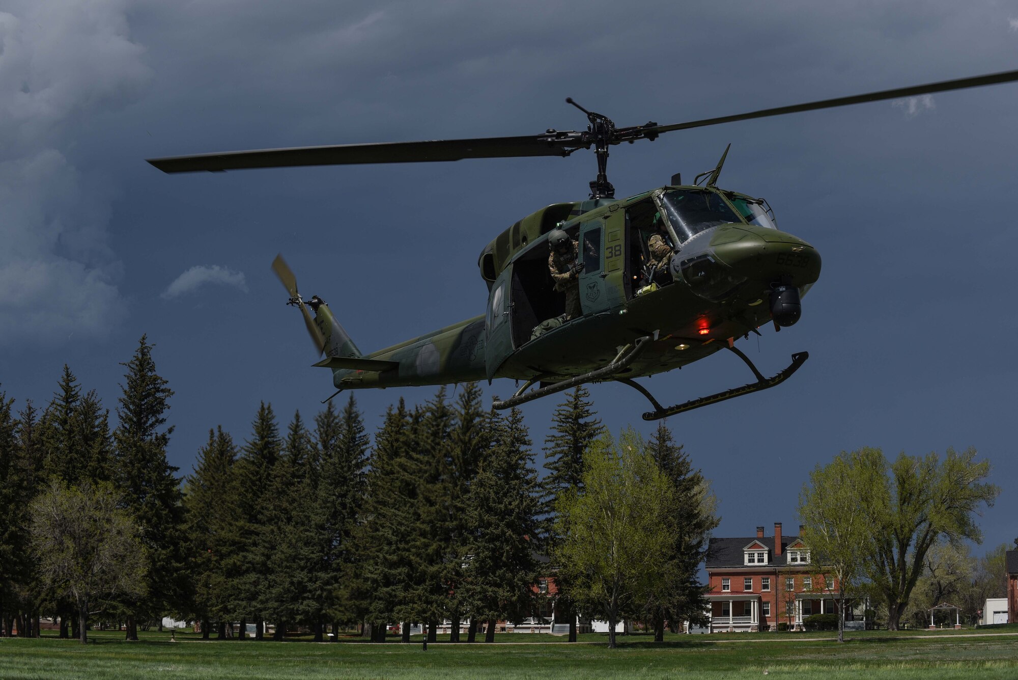 After receiving “injured patients” from a casualty evacuation scenario, the helicopter takes off for an incentive flight during 90th Mission Support Group’s Warrior Day, May 19, 2018, on F.E. Warren Air Force Base, Wyo. The helicopter pilots took Airmen on a fly-around of the city before landing at 37th Helicopter Squadron’s primary landing zone, followed by a tour of the 582nd Helicopter Group and sample mission brief. The Warrior Day was an all-day training event to reinforce deployment preparedness, warrior ethos and a commitment to teamwork. (U.S. Air Force photo by Airman 1st Class Abbigayle Wagner)