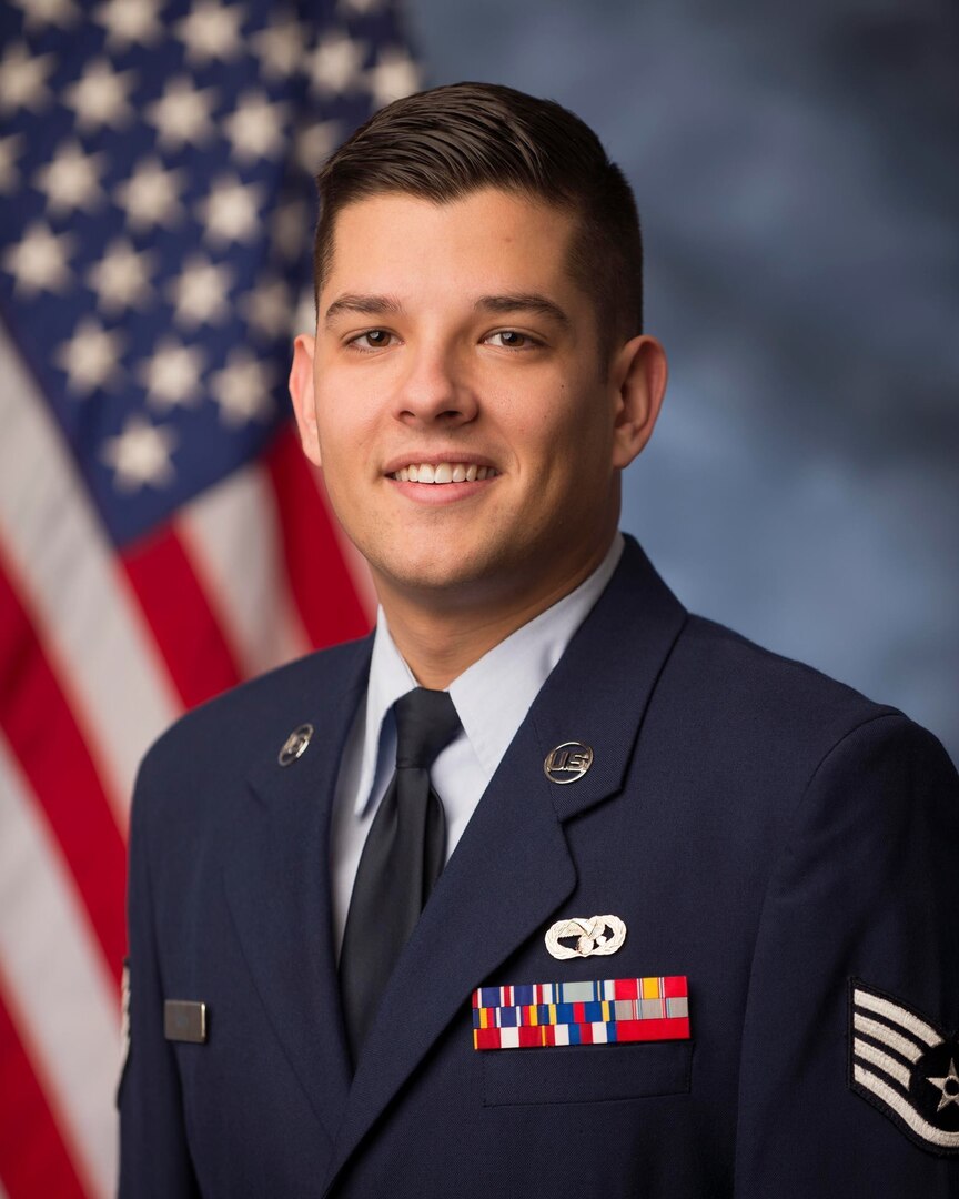 Tech. Sgt. Nicholas Riley, vehicle operations and ground transportation, 158th Fighter Wing, poses for an official photograph.