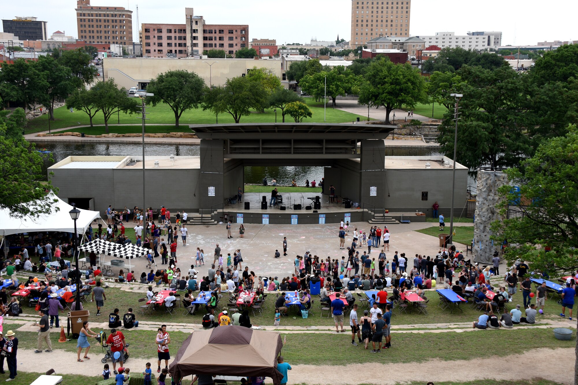 A crowd of Goodfellow members and their families attend Goodfellow Appreciation Day event at the Bill Aylor Sr. Memorial RiverStage in San Angelo, Texas, May 19, 2018. This marked the 13th year that the event has taken place and this provides the city of San Angelo an opportunity to demonstrate how they appreciate Goodfellow Air Force Base and the Armed Forces. (U.S. Air Force photo by Airman 1st Class Zachary Chapman/Released)