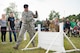 U.S. Air Force Staff Sgt. Andrew Kraft, 86th Security Forces Squadron military working dog handler, directs Sky, 86th SFS MWD, during Police Week 2018 on Ramstein Air Base, Germany 2018. The Police Week events involve the entire Kaiserslautern Military Community and build relationships with the general public. (U.S. Air Force photo by Senior Airman Elizabeth Baker)