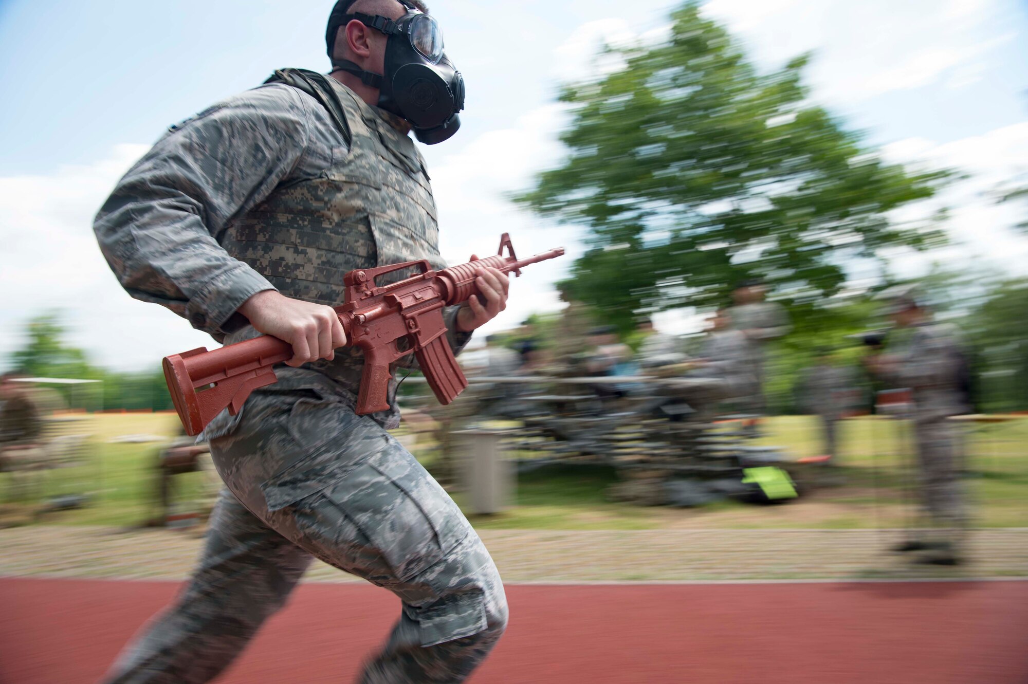 A U.S. Airman participates in a relay race during the Police Week 2018 Battle of the Badges on Ramstein Air Base, Germany, May 15, 2018. The events of Police Week raise money to go towards organizations that support law enforcement officers who died in the line of duty or survived a traumatic experience.