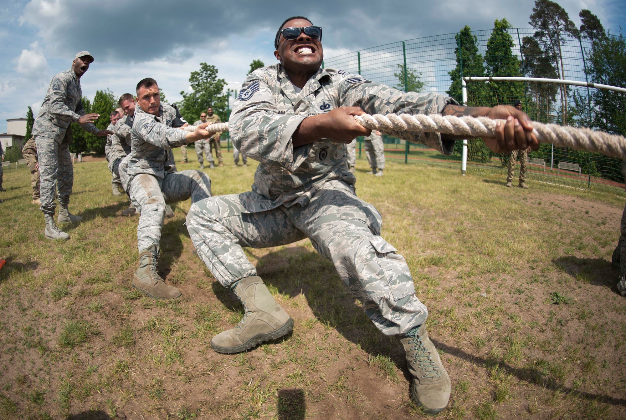 U.S. Airman participates in a tug-of-war contest during Police Week 2018 on Ramstein Air Base, Germany, May 15, 2018. Eight law enforcement units, including the 86th Security forces Squadron, the 569th U.S. Forces Police Squadron, and the 435th Contingency Response Group, competed against each other in tests of strength, endurance, and weapons handling.