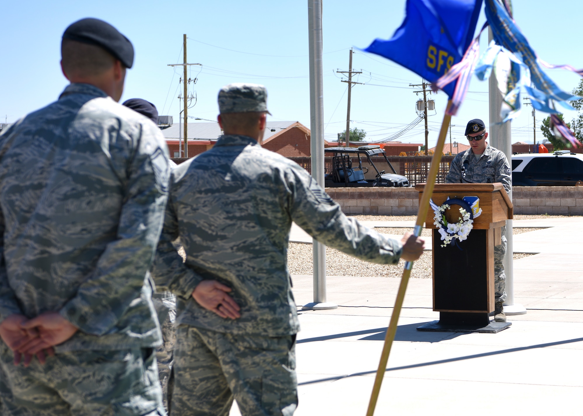 Security Forces member speaks at ceremony.