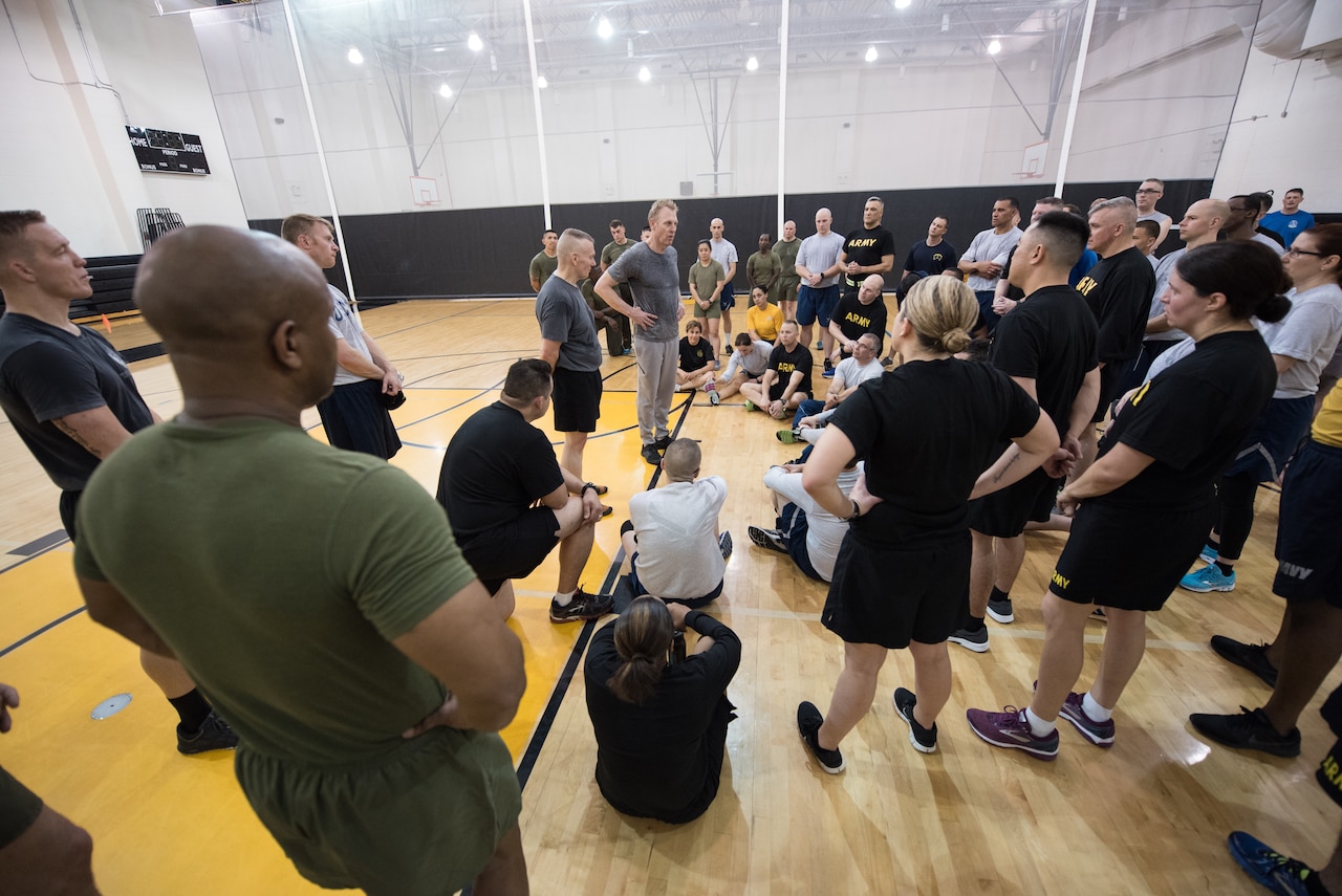 Army Command Sgt. Maj. John W. Troxell, senior enlisted advisor to the chairman of the Joint Chiefs of Staff, hosts a physical training session with Deputy Defense Secretary Patrick M. Shanahan and service members from across the joint force at the inaugural DoD Readiness and Resilience Workshop at Fort McNair in  Washington.