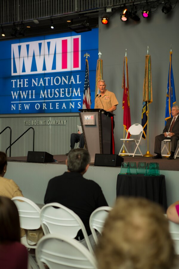 Lt. Gen. Rex C. McMillian (center), commander of Marine Forces Reserve and Marine Forces North, speaks to the guests and service members during the Mayor’s Community Service Award at the World War II Museum in New Orleans, Louisiana, May 19, 2018. An award is presented to one service member of each military service for their dedication to the local community and the Greater New Orleans area. (U.S. Marine Corps photo by Lance Cpl. Melany Vasquez/Released)