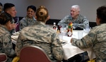 Lt. Gen. L. Scott Rice, Air National Guard Director, visits with airmen from the 149th Fighter Wing during a lucheon at the Live Oak dining facility at Joint Base San Antonio-Lackland May 19.