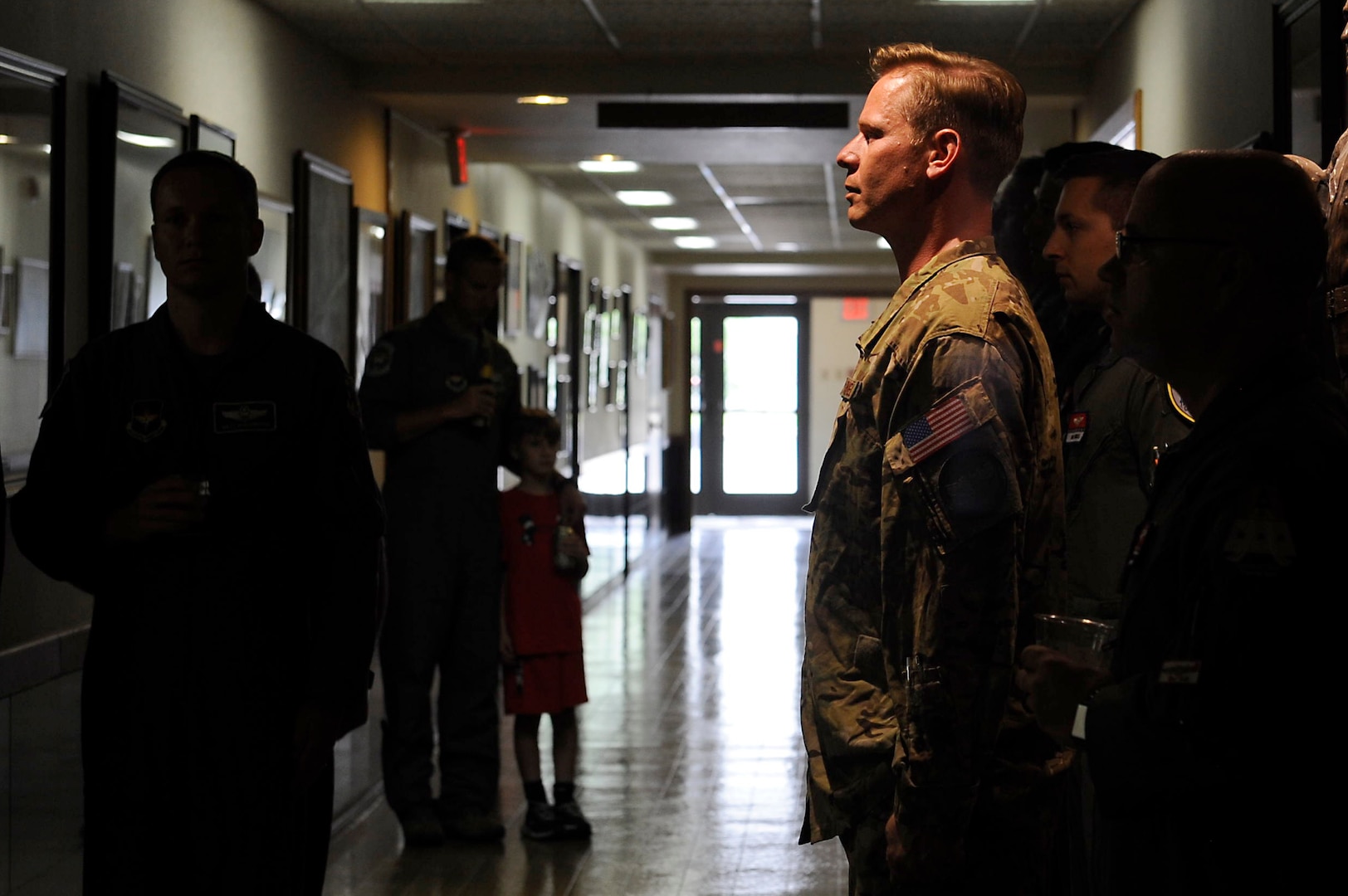 Wearing the Army combat uniform, Lt. Col. Jason Powell, Air Education and Training Command deputy director for safety, leads the roll call for the NATO Air Training Command Afghanistan, NATC-A NINE, April 27, 2018, Randolph AFB, Texas. Powell was on the next rotation that followed this tragic event and has flown with the 99th FTS for the last four years. Among the victims was Maj. Jeff ‘Oz’ Ausborn, who was deployed from the 99th FTS. (U.S. Air Force photo by Tech. Sgt. Ave I. Young)