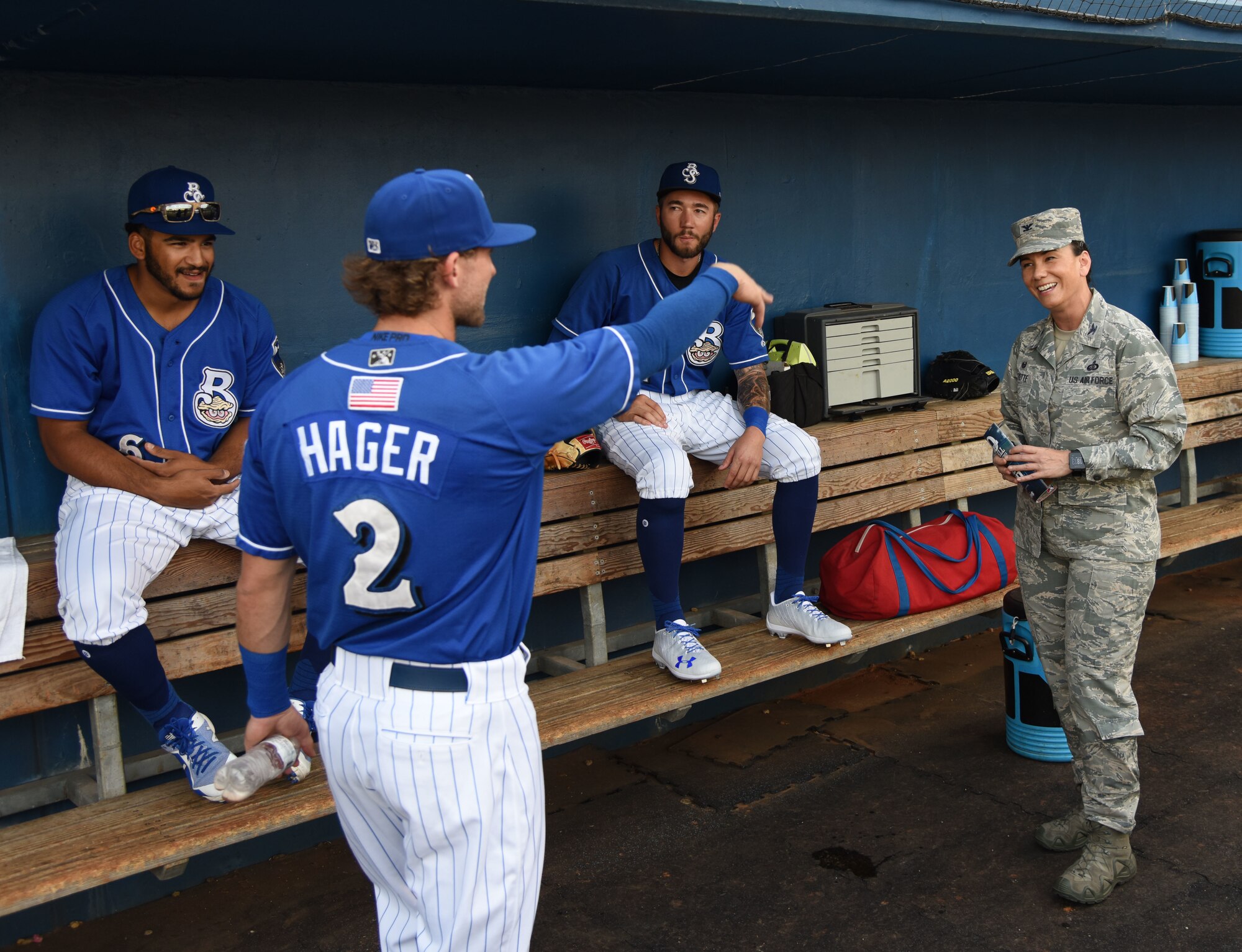 Jake Hager, Biloxi Shuckers short stop, gives pitching tips to Col. Debra A. Lovette, 81st Training Wing commander, during a Biloxi Shuckers baseball game, in Biloxi, Mississippi, May 17, 2018. Lovette threw the first pitch during pre-game festivities. (U.S. Air Force photo by Kemberly Groue)