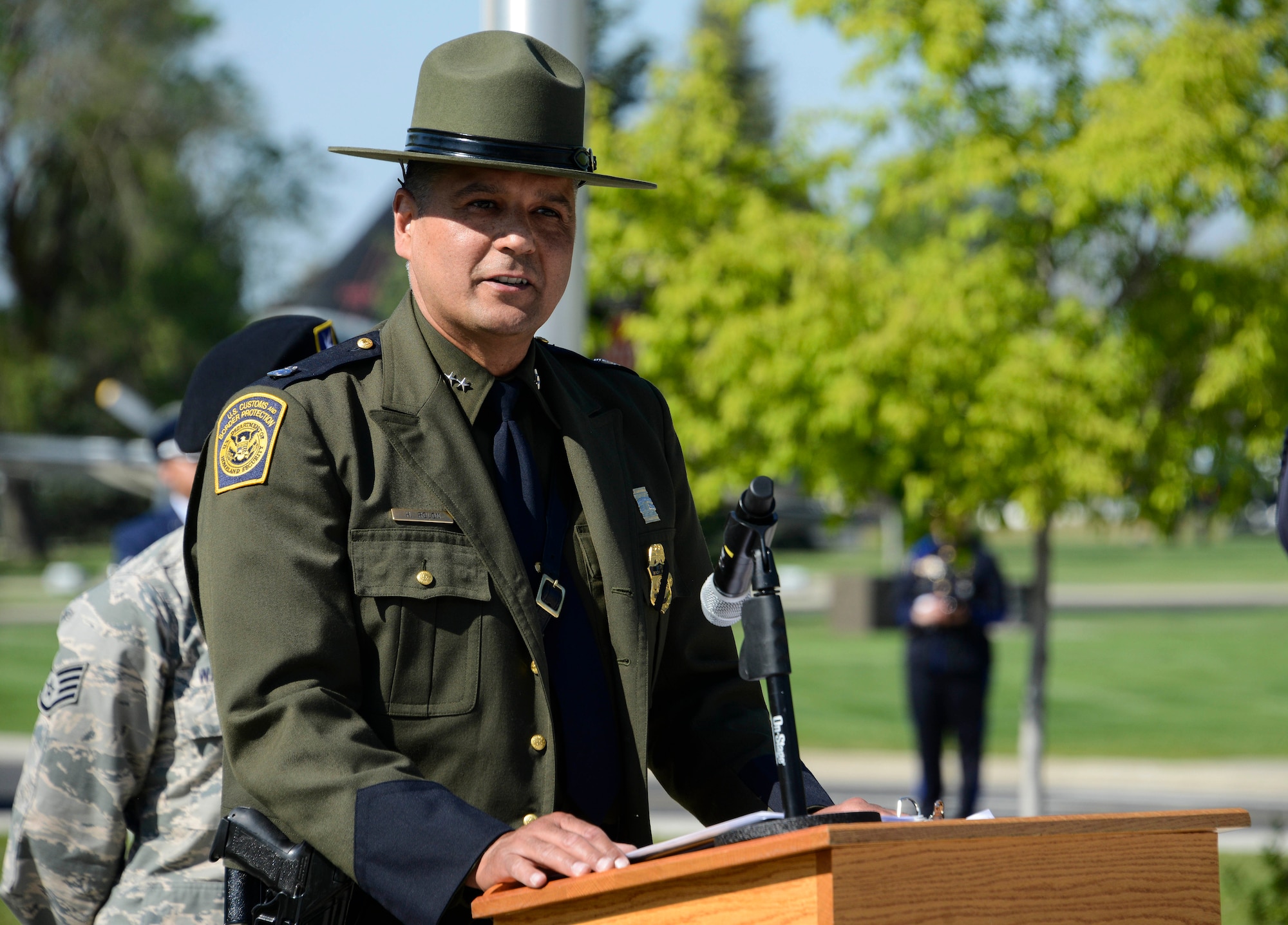 Henry Rolon, Spokane Police Department Sector Chief patrol agent, speaks about the importance of Police Week during a National Police Week Memorial Retreat Ceremony at Fairchild Air Force Base, Washington, May 16, 2018.  The retreat is a ceremony during National Police Week to honor fallen law enforcement professionals.